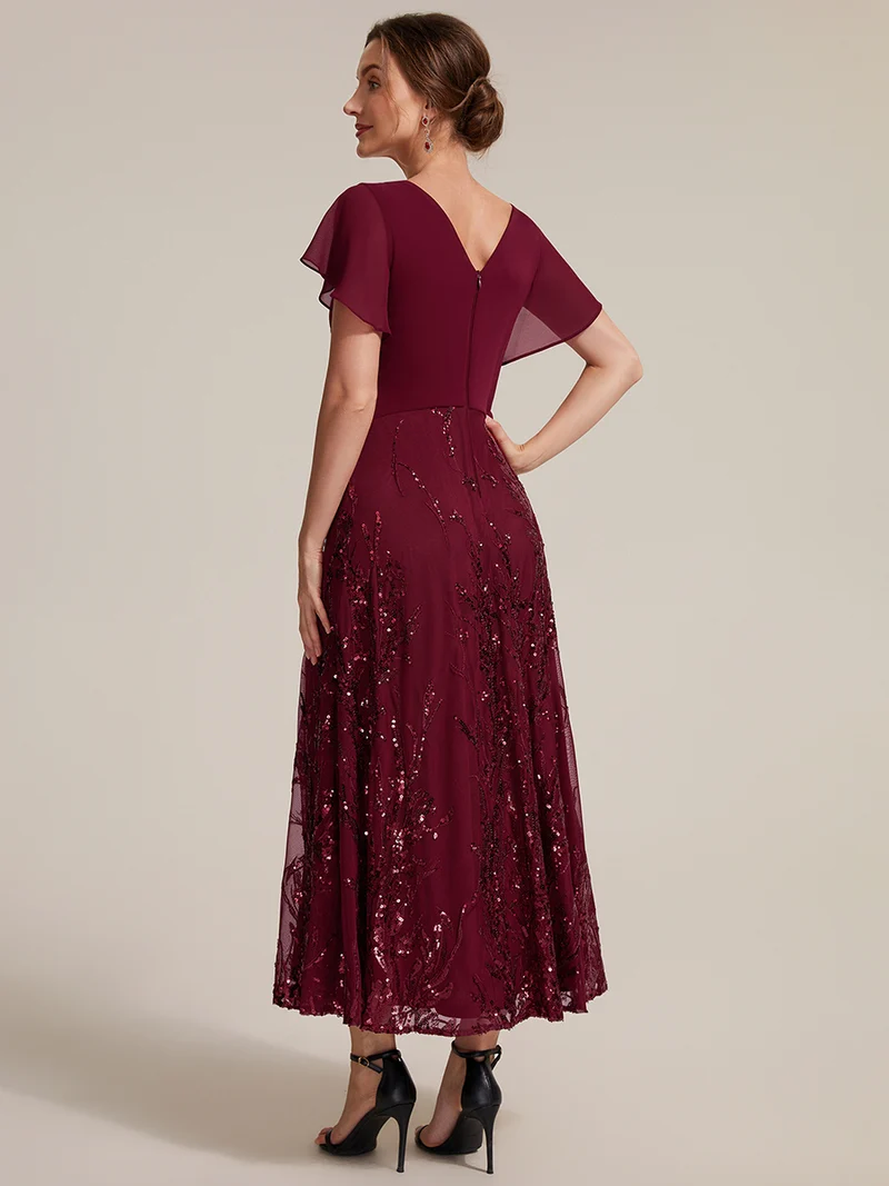 Robe midi en mousseline à paillettes avec col V et manches volantées