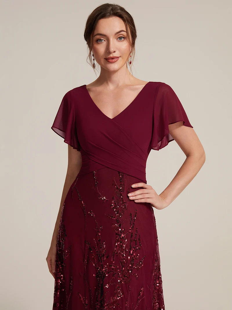 Robe midi en mousseline à paillettes avec col V et manches volantées