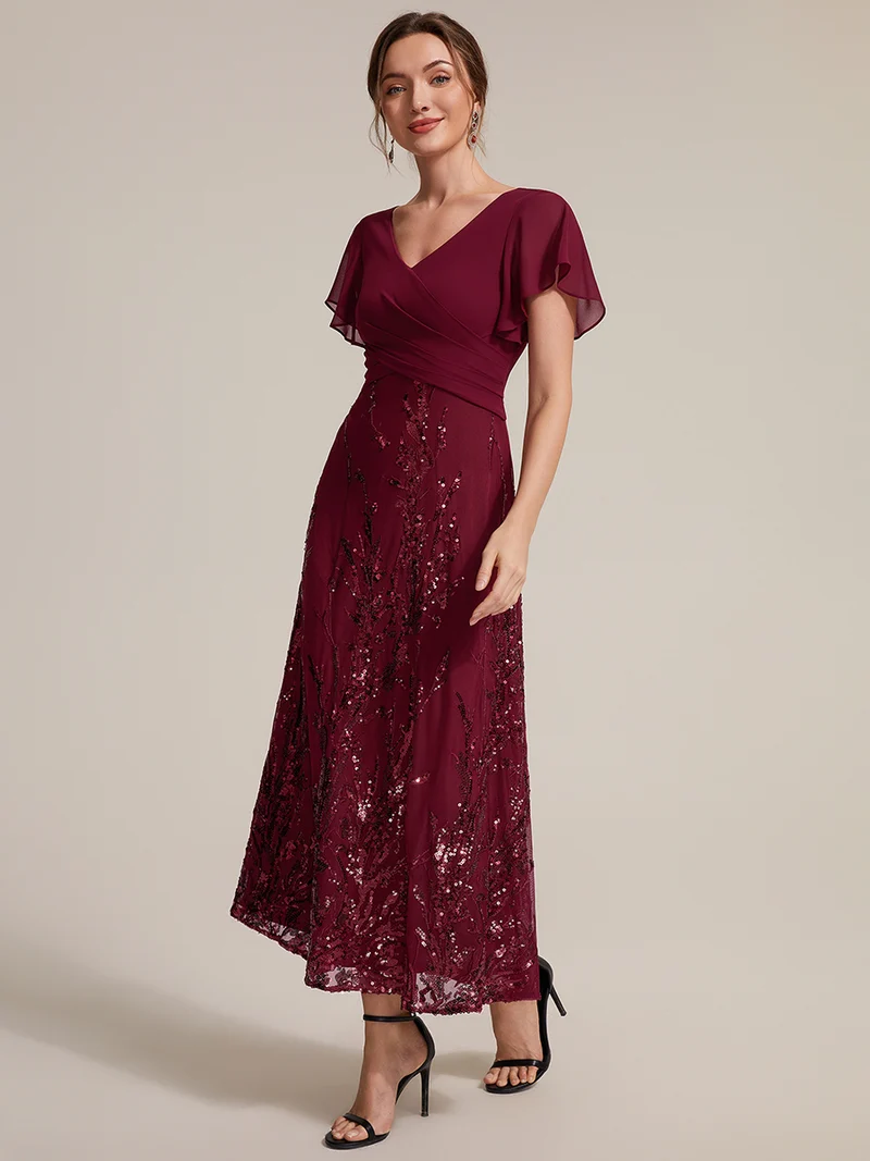 Robe midi en mousseline à paillettes avec col V et manches volantées