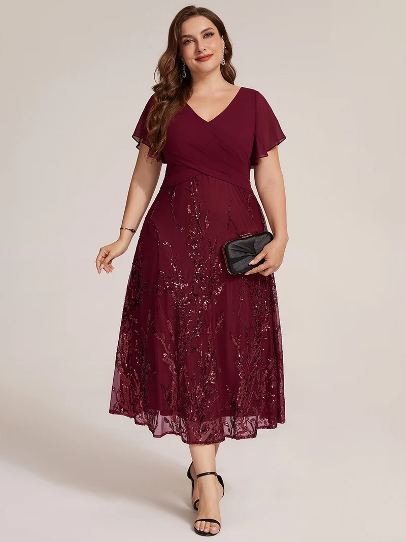 Robe midi en mousseline à paillettes avec col V et manches volantées