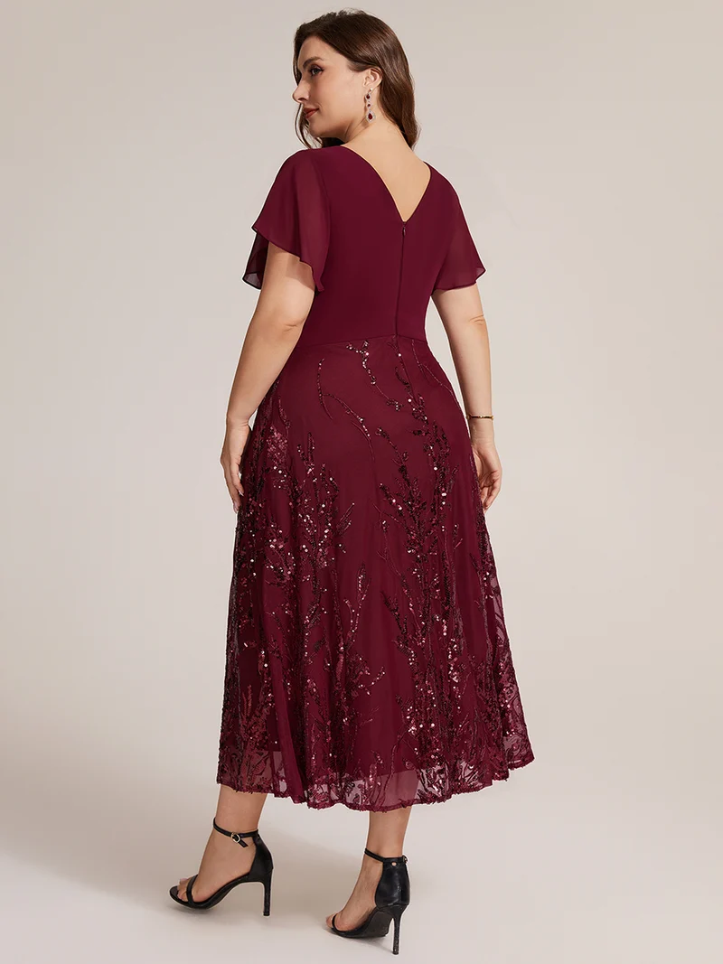 Robe midi en mousseline à paillettes avec col V et manches volantées