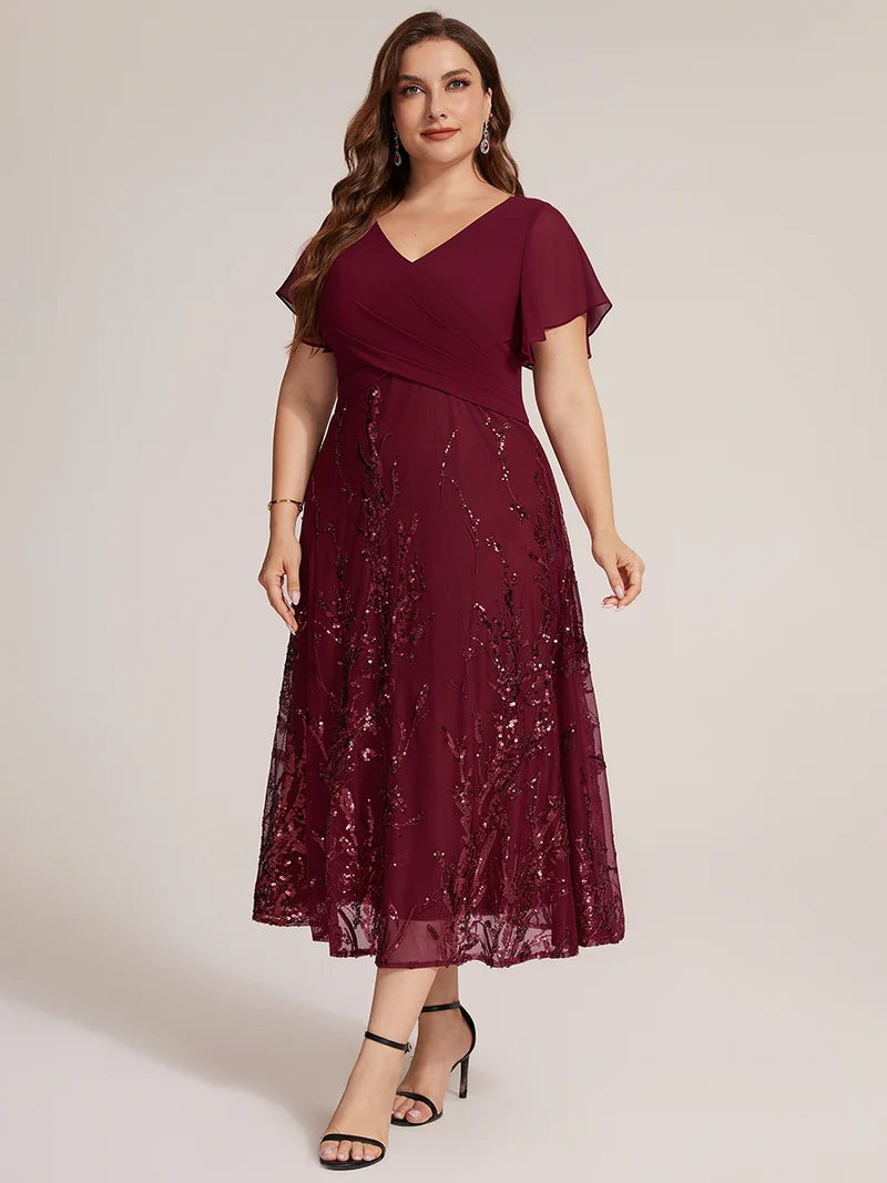 Robe midi en mousseline à paillettes avec col V et manches volantées