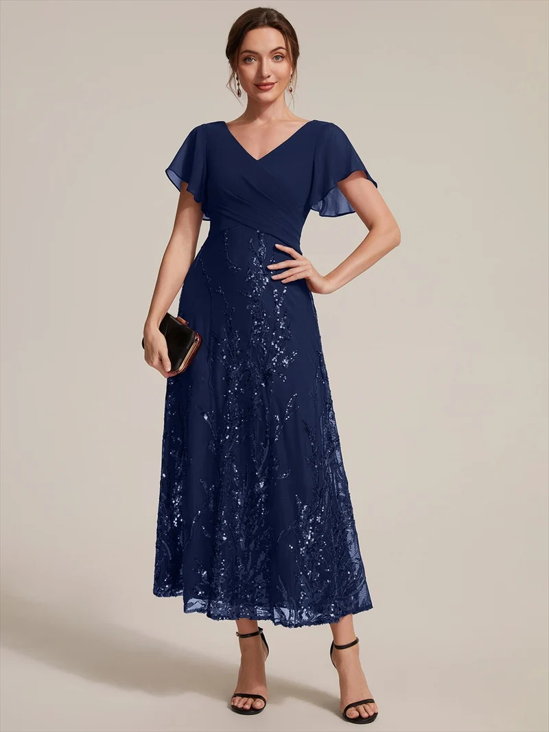 Robe midi en mousseline à paillettes avec col V et manches volantées