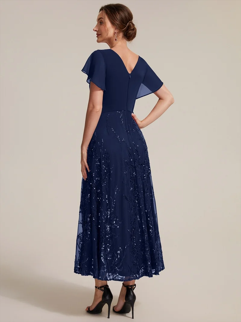 Robe midi en mousseline à paillettes avec col V et manches volantées