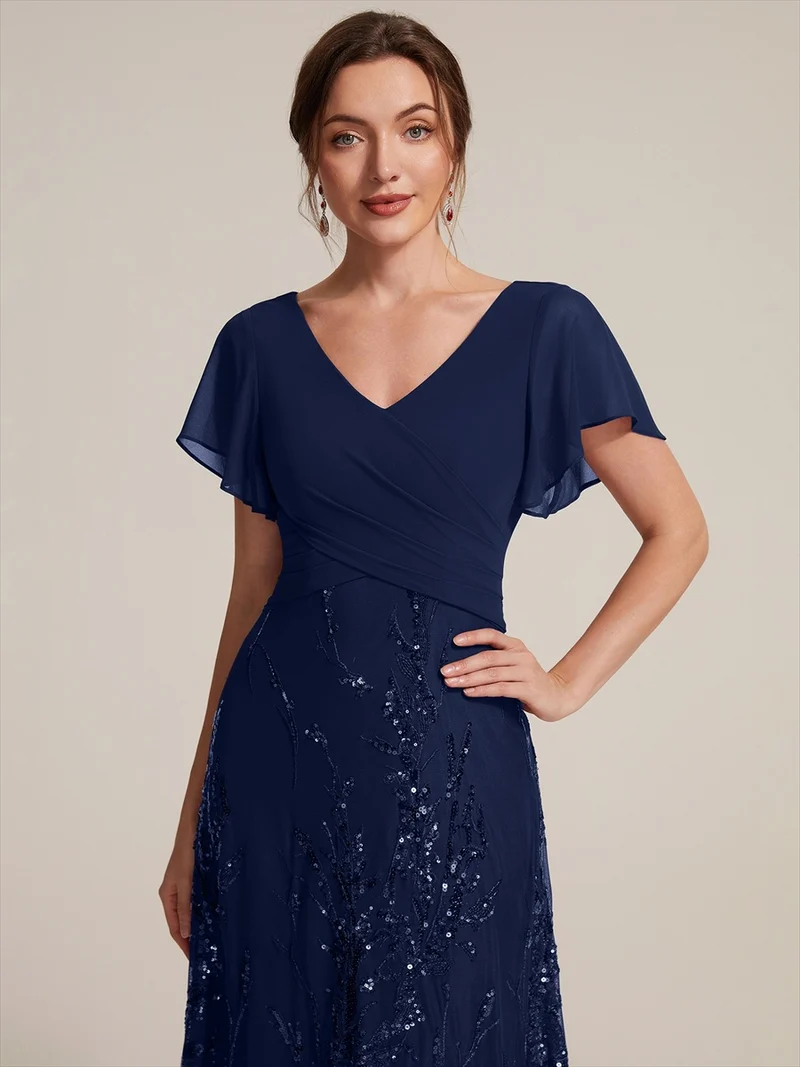 Robe midi en mousseline à paillettes avec col V et manches volantées