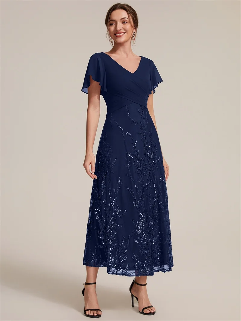 Robe midi en mousseline à paillettes avec col V et manches volantées