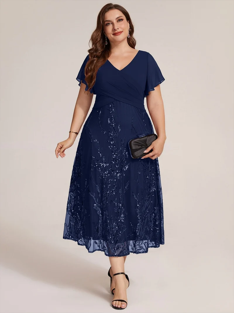 Robe midi en mousseline à paillettes avec col V et manches volantées