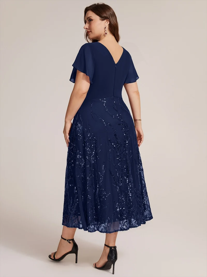 Robe midi en mousseline à paillettes avec col V et manches volantées