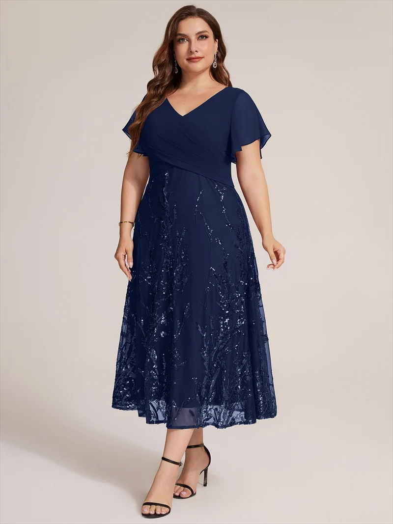 Robe midi en mousseline à paillettes avec col V et manches volantées