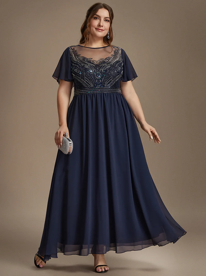 Robe longue en tulle perlée à coupe trapèze et manches volantées