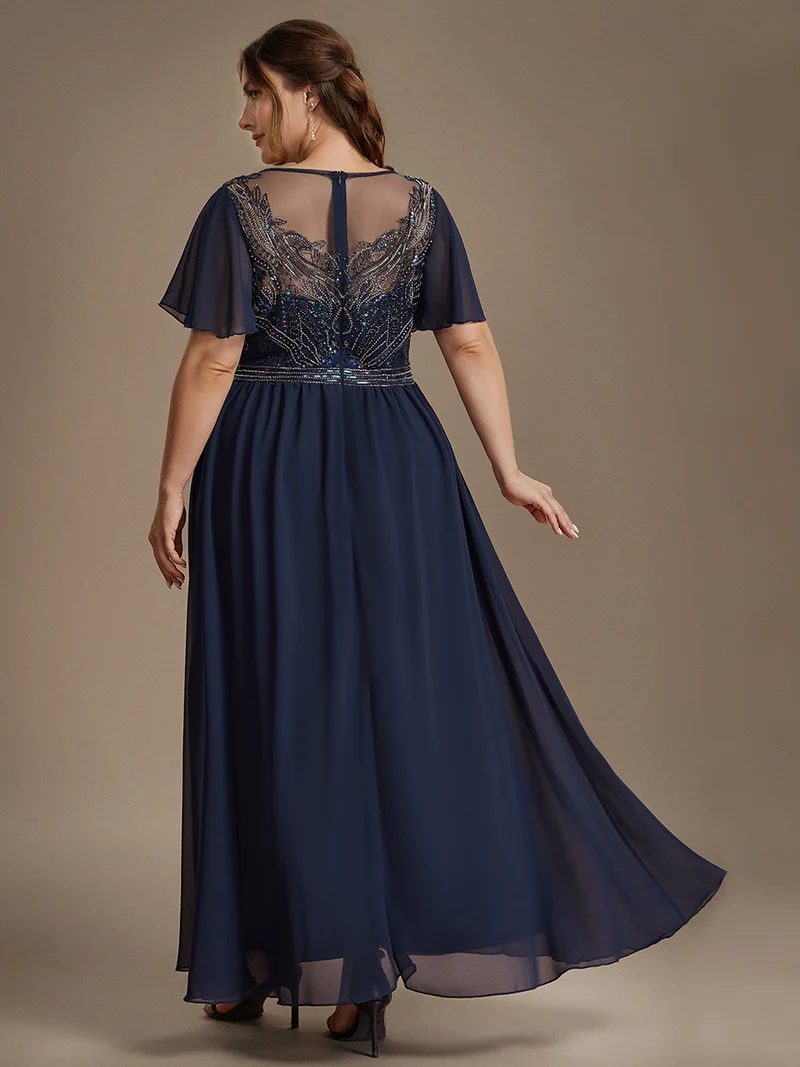Robe longue en tulle perlée à coupe trapèze et manches volantées
