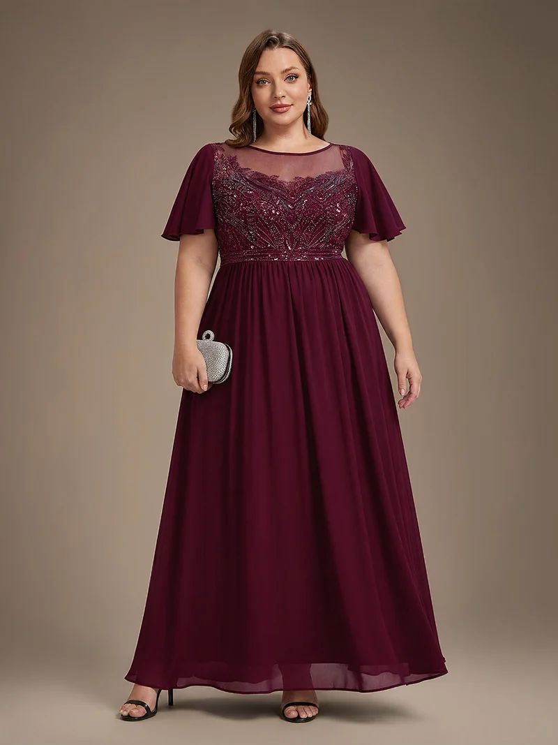 Robe longue en tulle perlée à coupe trapèze et manches volantées