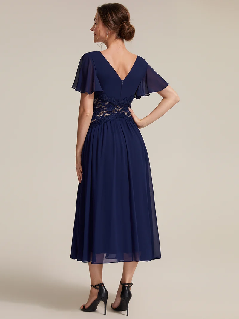 Robe midi en mousseline avec dentelle et manches volantées