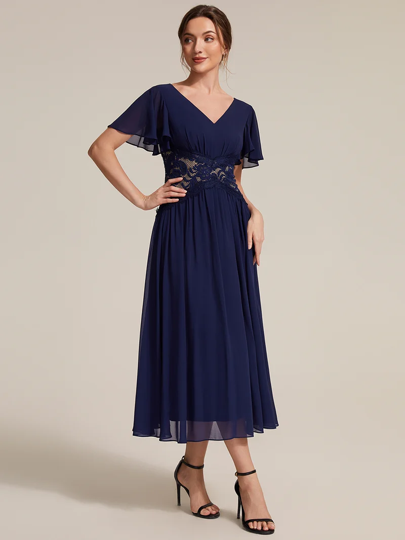 Robe midi en mousseline avec dentelle et manches volantées