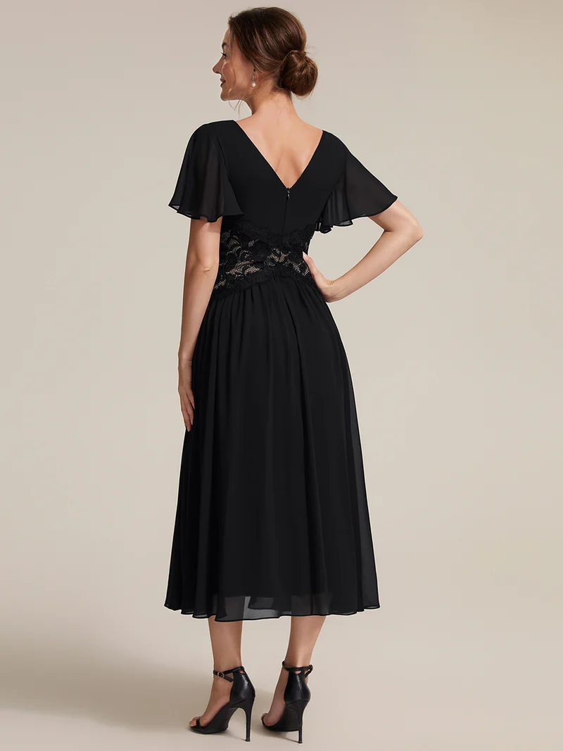 Robe midi en mousseline avec dentelle et manches volantées