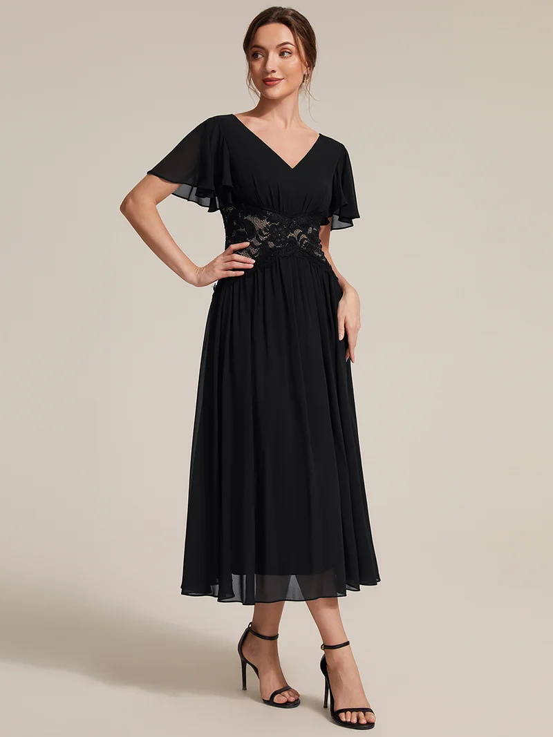Robe midi en mousseline avec dentelle et manches volantées