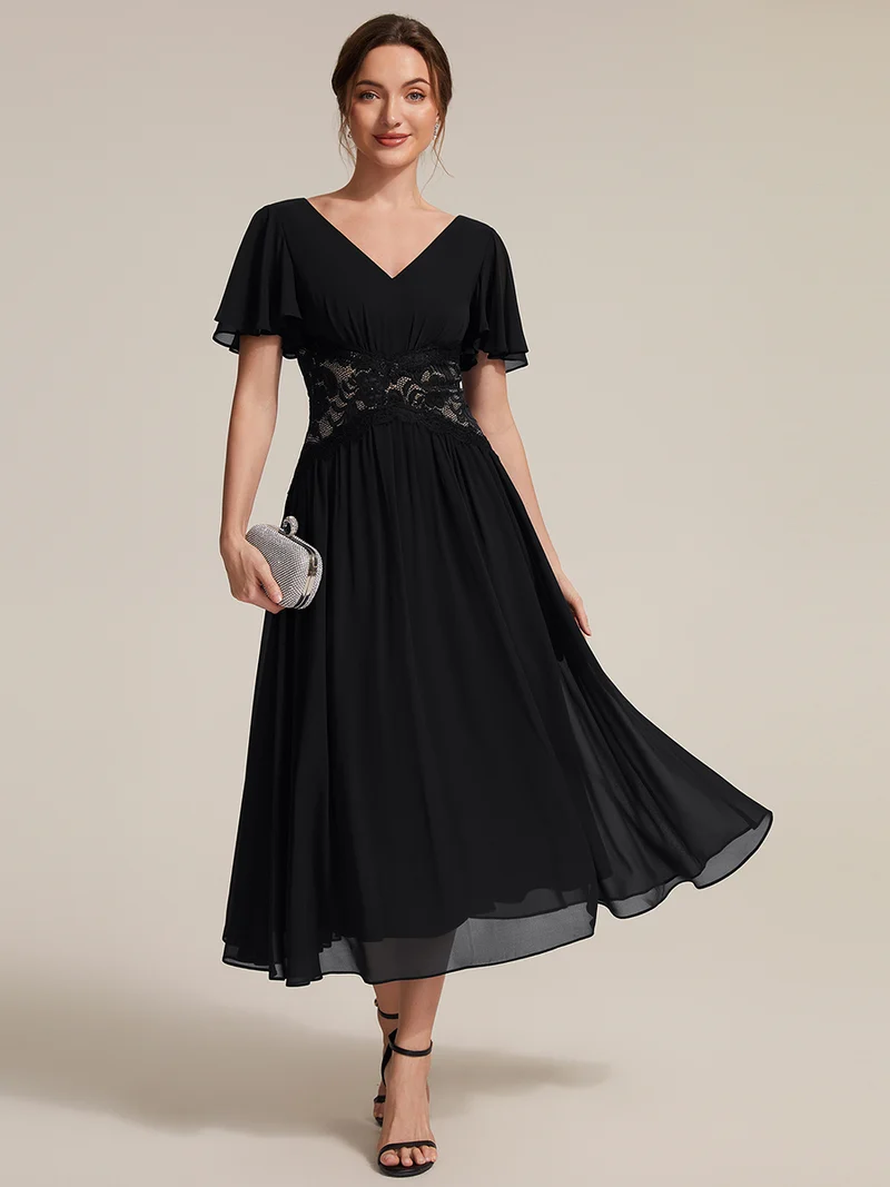 Robe midi en mousseline avec dentelle et manches volantées