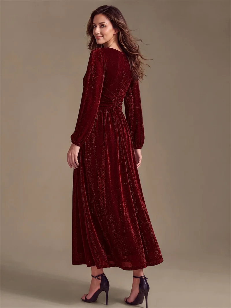 Robe de soirée longue en maille lurex à col V et manches bouffantes