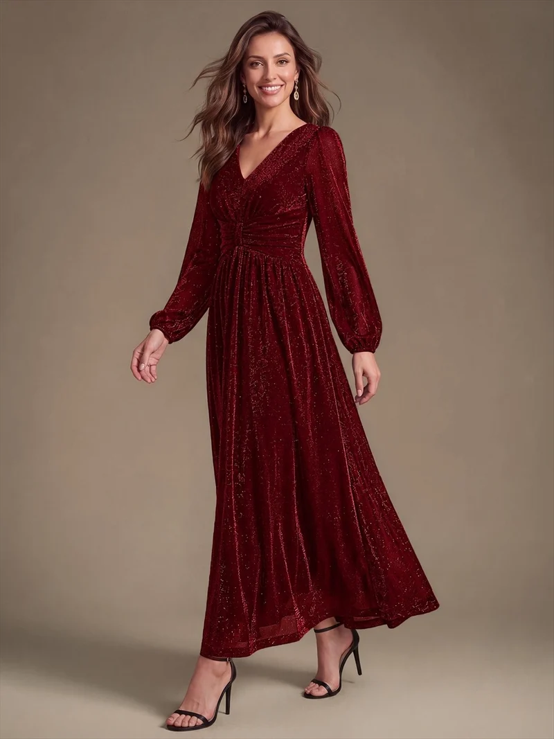Robe de soirée longue en maille lurex à col V et manches bouffantes