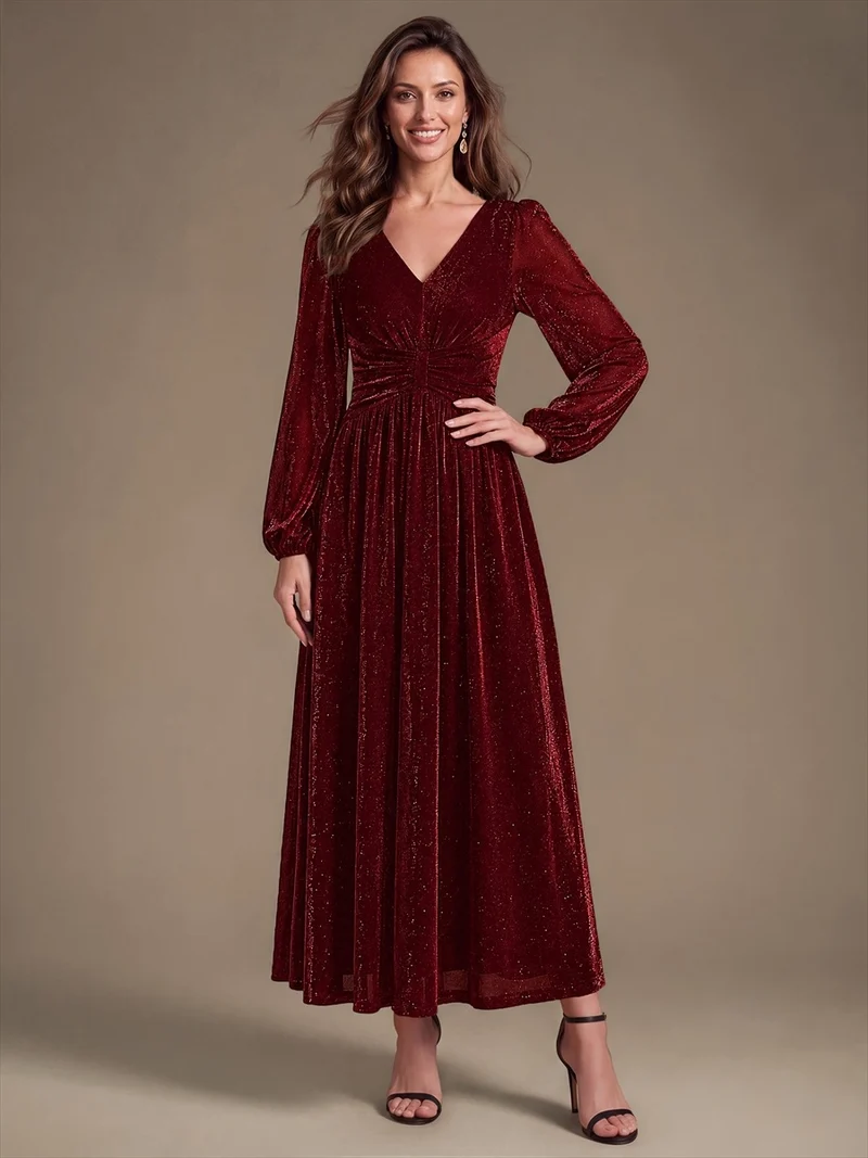 Robe de soirée longue en maille lurex à col V et manches bouffantes