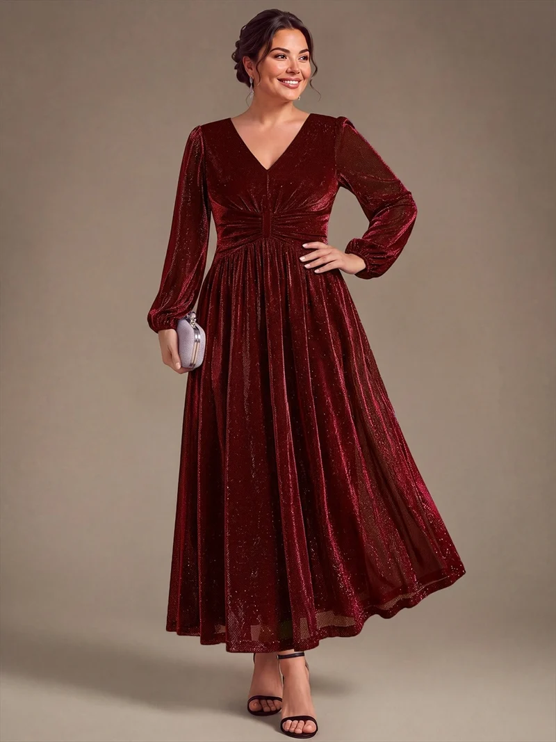 Robe de soirée longue en maille lurex à col V et manches bouffantes