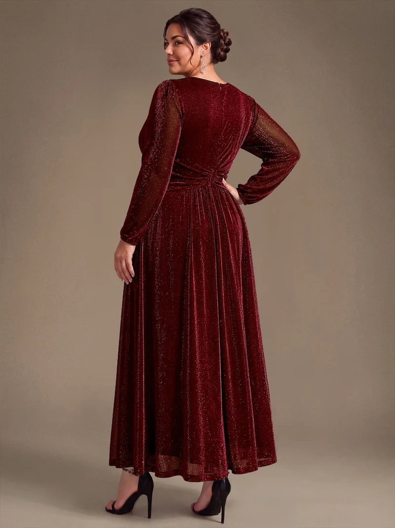 Robe de soirée longue en maille lurex à col V et manches bouffantes