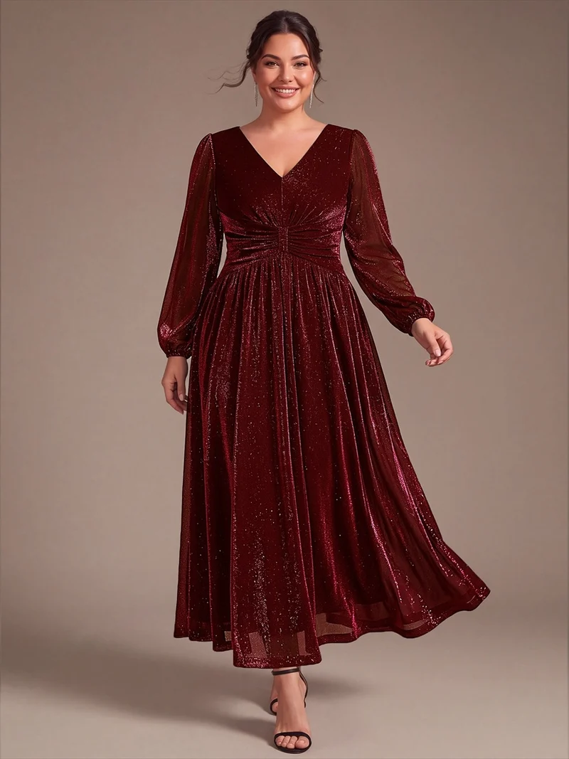 Robe de soirée longue en maille lurex à col V et manches bouffantes