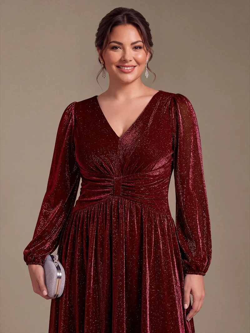 Robe de soirée longue en maille lurex à col V et manches bouffantes