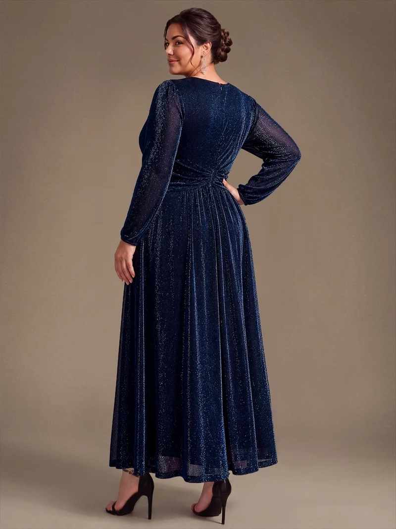 Robe de soirée longue en maille lurex à col V et manches bouffantes