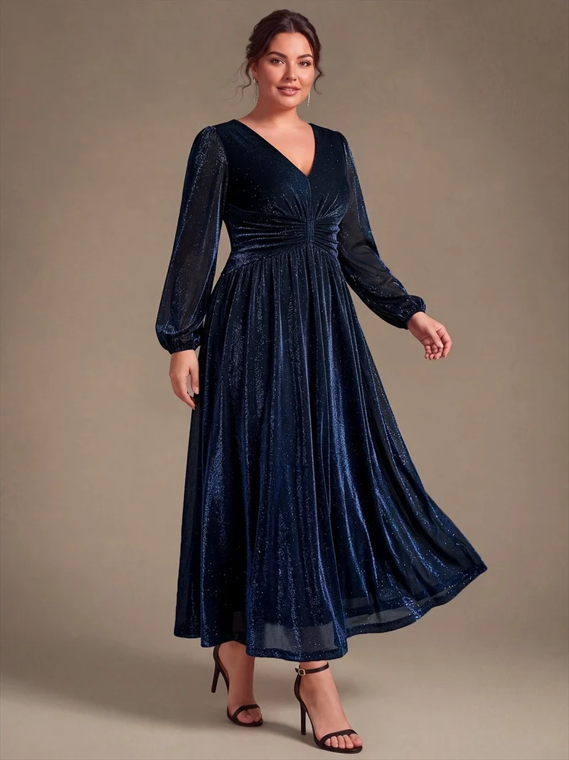 Robe de soirée longue en maille lurex à col V et manches bouffantes