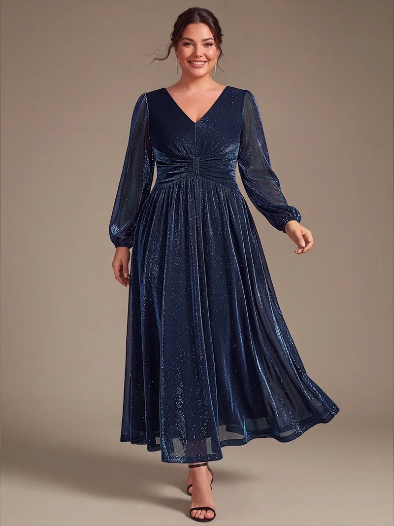 Robe de soirée longue en maille lurex à col V et manches bouffantes
