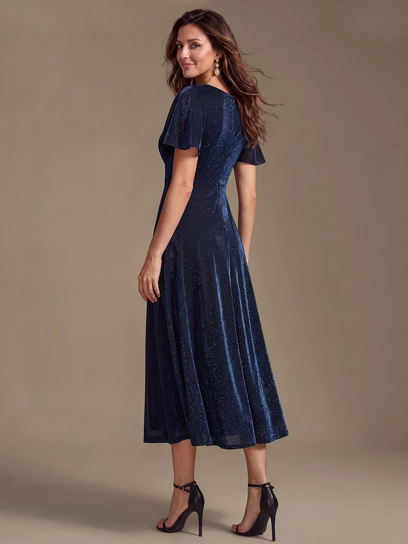 Robe longue en tulle lurex drapée coupe trapèze à manches volantées