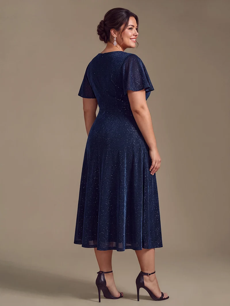 Robe longue en tulle lurex drapée coupe trapèze à manches volantées