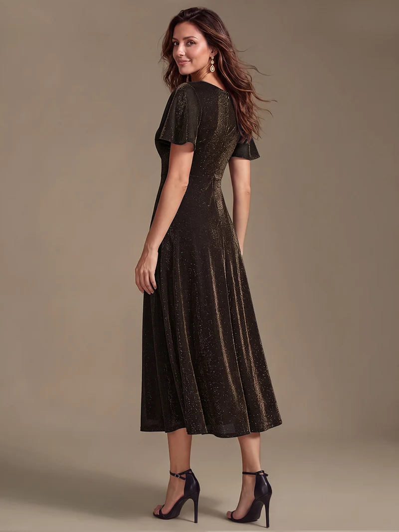 Robe longue en tulle lurex drapée coupe trapèze à manches volantées