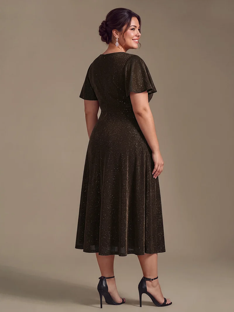 Robe longue en tulle lurex drapée coupe trapèze à manches volantées