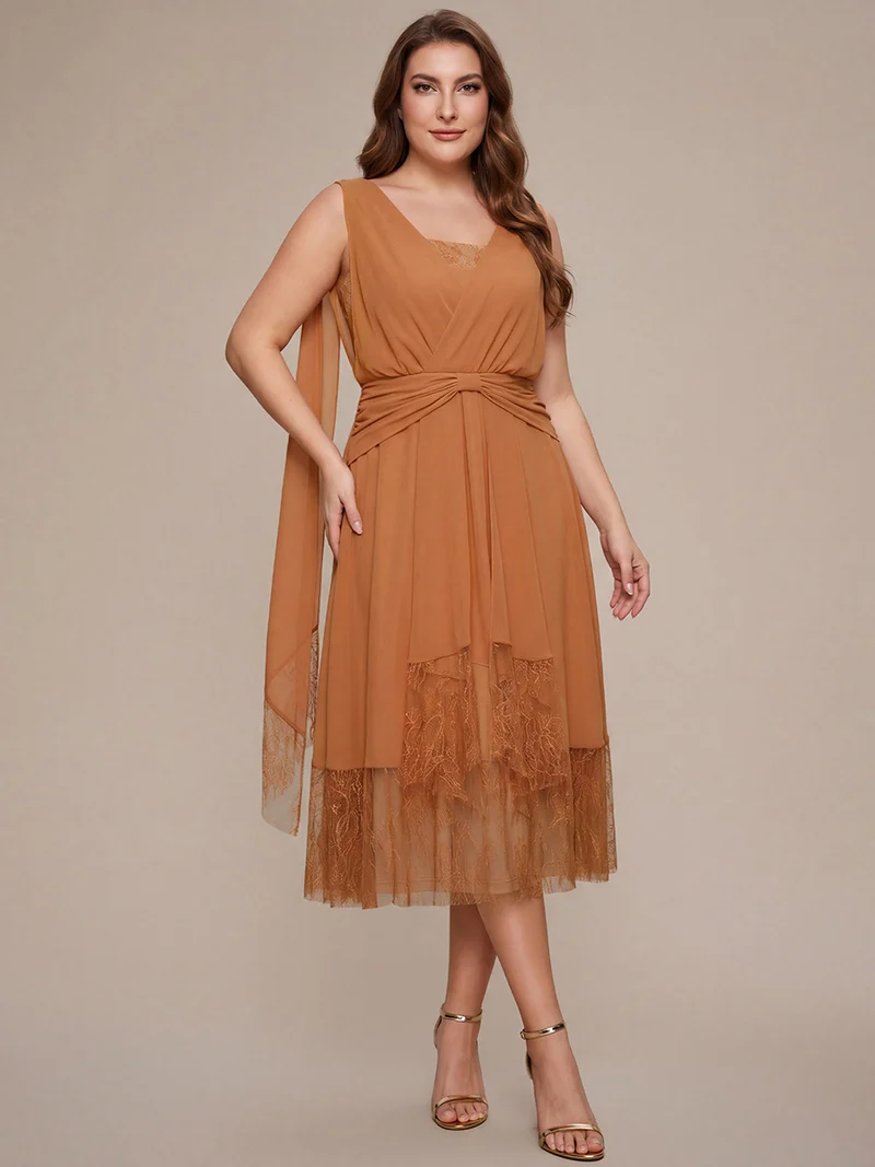 Robe midi trapèze en mousseline avec détails en dentelle col V