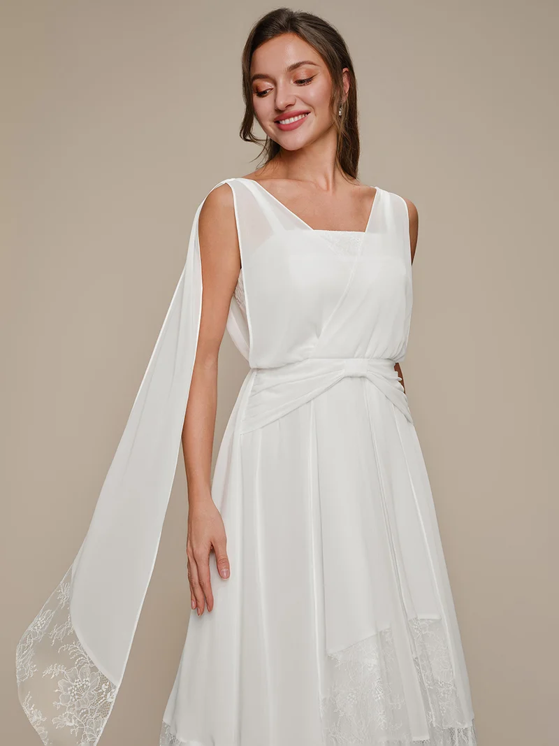 Robe midi trapèze en mousseline avec détails en dentelle col V