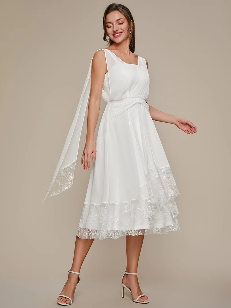 Robe midi trapèze en mousseline avec détails en dentelle col V