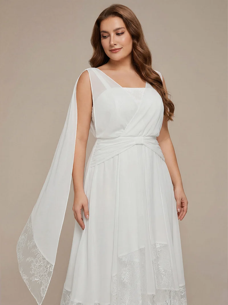 Robe midi trapèze en mousseline avec détails en dentelle col V
