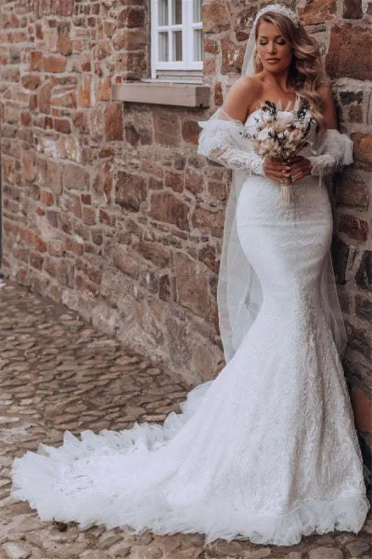Robe de mariée sirène à col en cœur avec manches bouffantes en dentelle et traîne