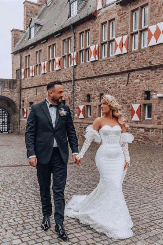 Robe de mariée sirène à col en cœur avec manches bouffantes en dentelle et traîne