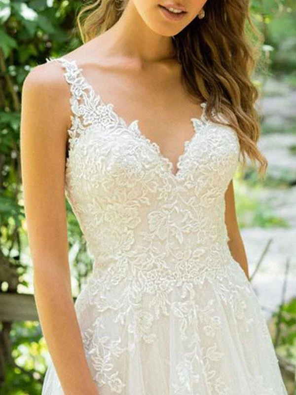 Robe de mariée de plage sans manches en tulle et dentelle avec jupe à appliqués
