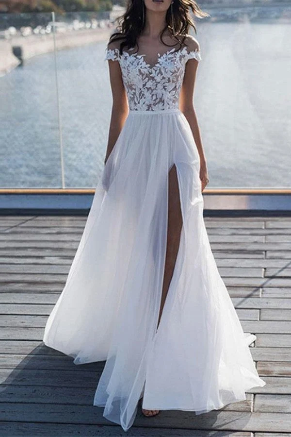 Robe de mariée à manches courtes et jupe en tulle fendue