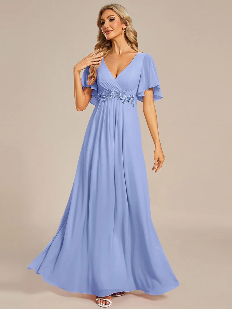 Robe longue à manches à volants décolleté en V profond avec appliques coupe évasée