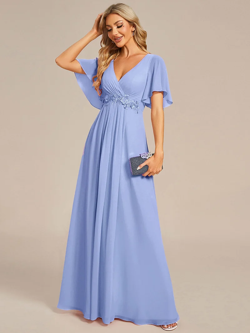 Robe longue à manches à volants décolleté en V profond avec appliques coupe évasée