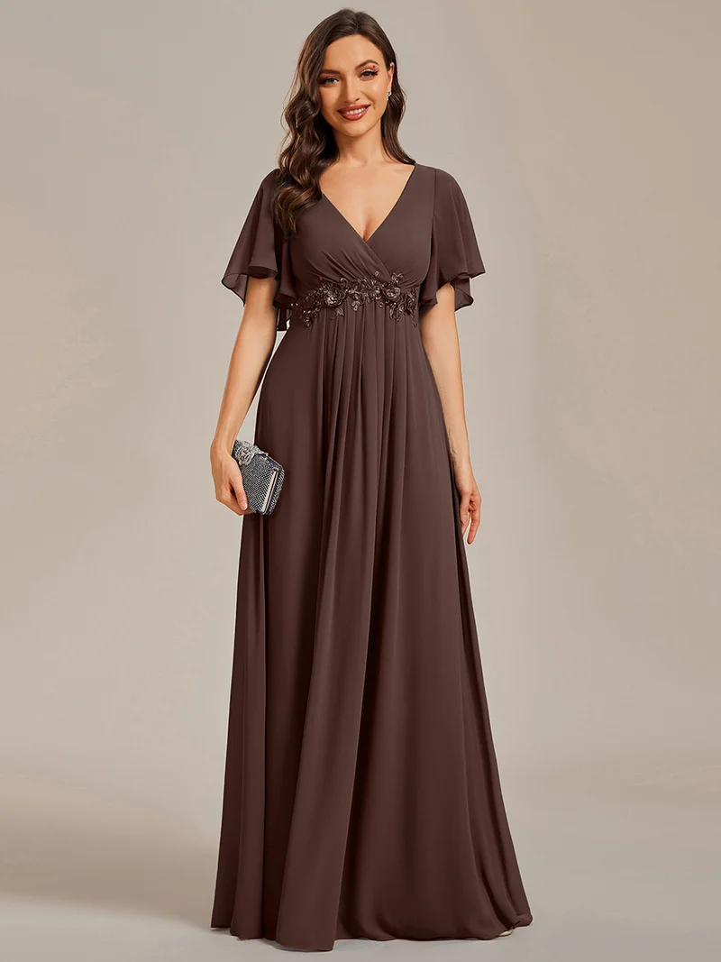 Robe longue à manches à volants décolleté en V profond avec appliques coupe évasée