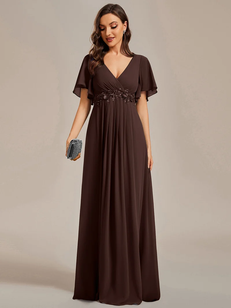 Robe longue à manches à volants décolleté en V profond avec appliques coupe évasée