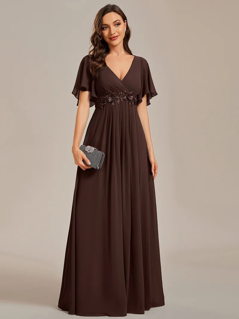 Robe longue à manches à volants décolleté en V profond avec appliques coupe évasée