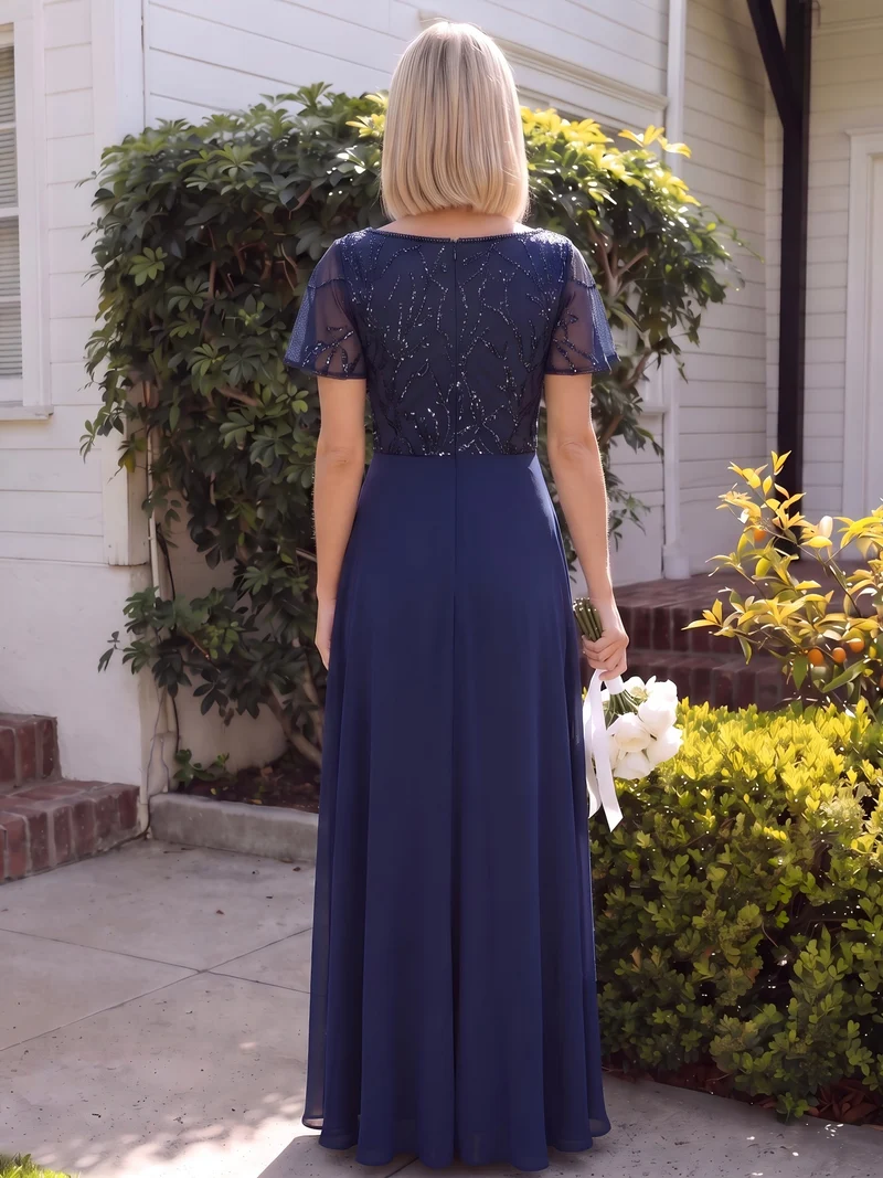 Robe longue stretch col en V avec volants et appliqués