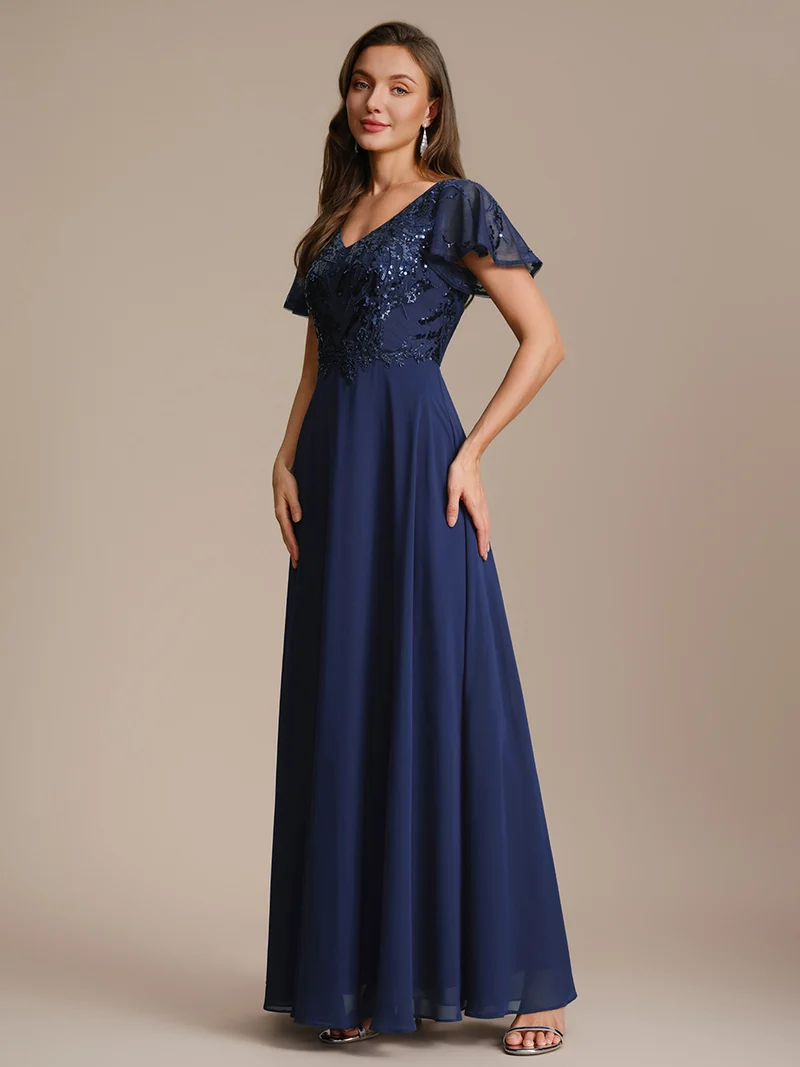 Robe longue stretch col en V avec volants et appliqués